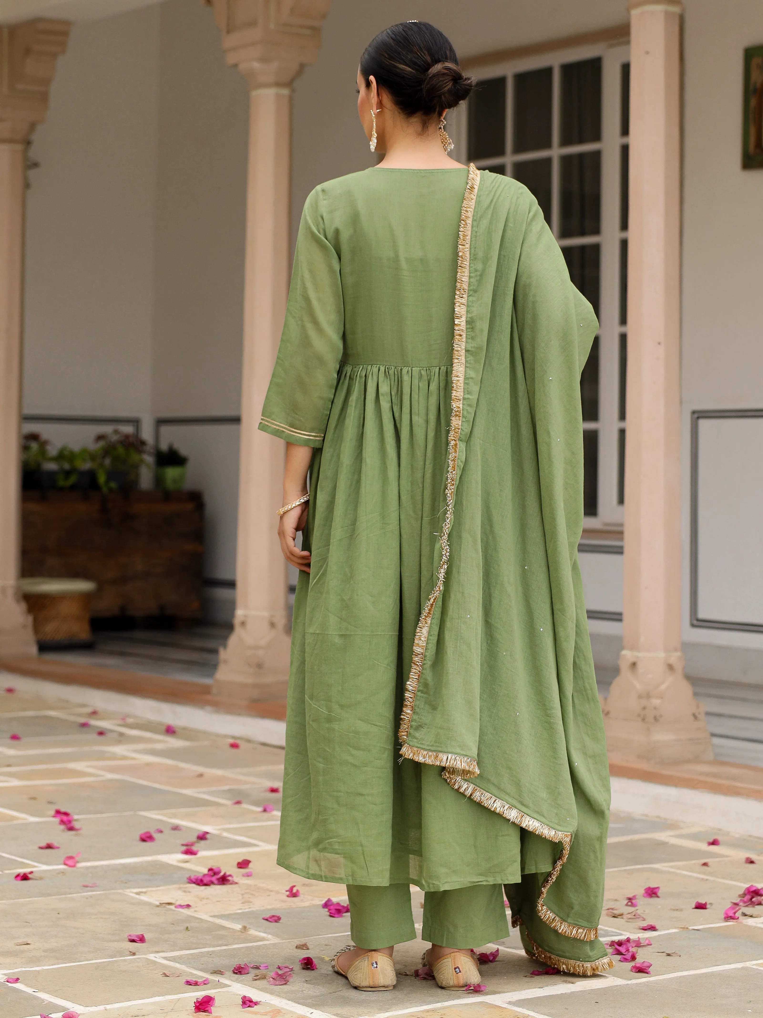 Light green mulmul cotton anarkali kurta set with trousers and dupatta