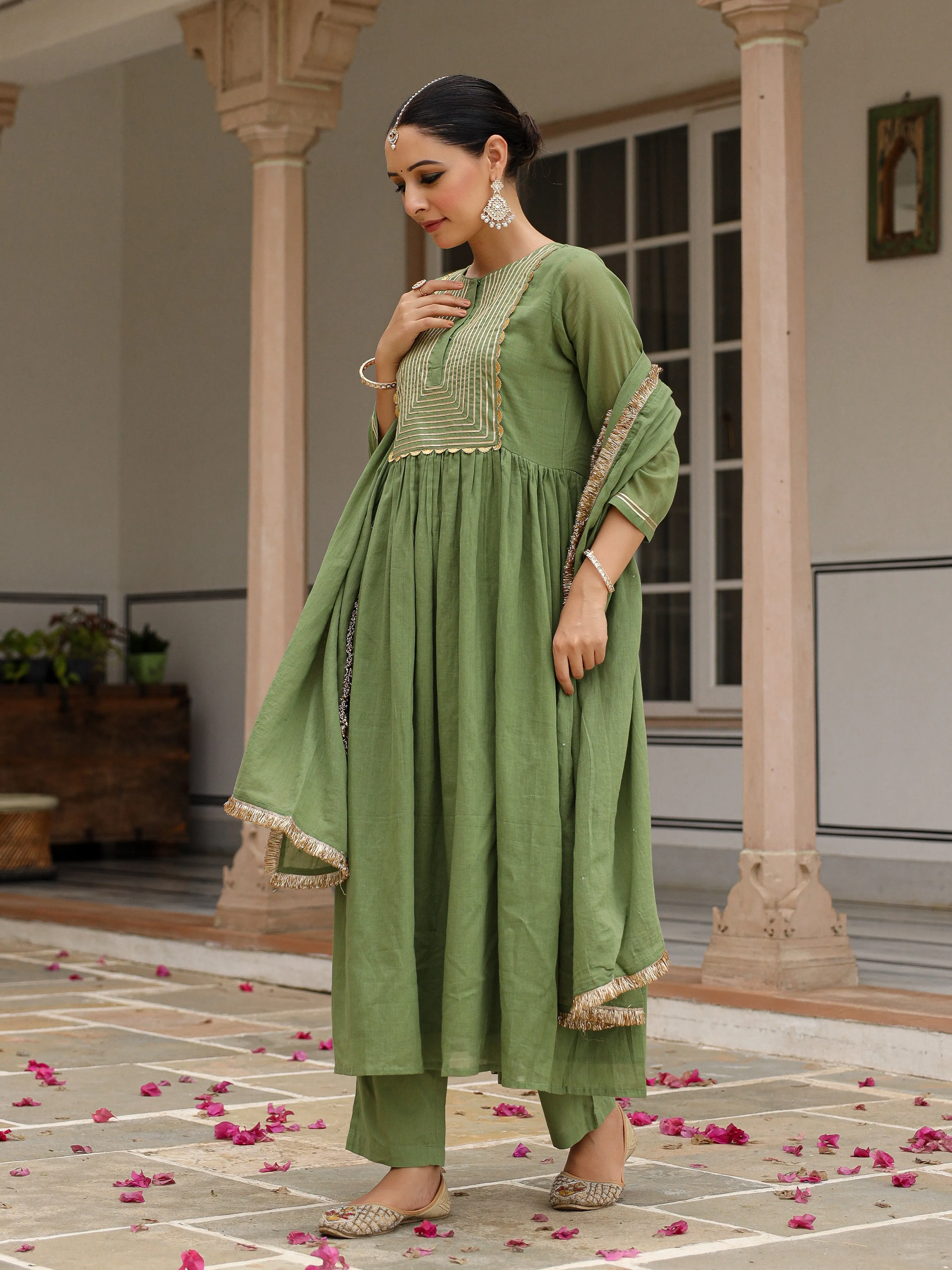 Light green mulmul cotton anarkali kurta set with trousers and dupatta