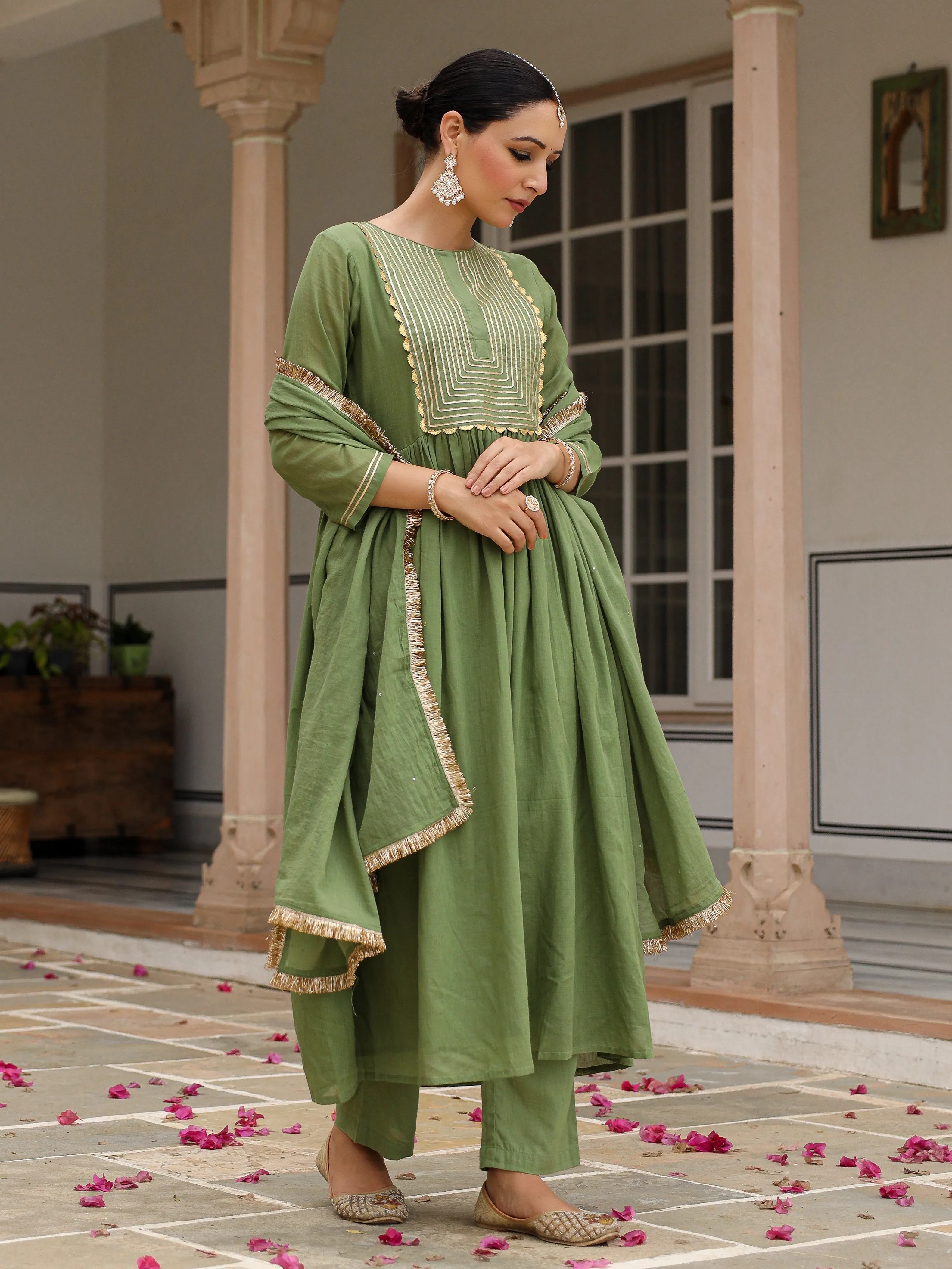 Light green mulmul cotton anarkali kurta set with trousers and dupatta