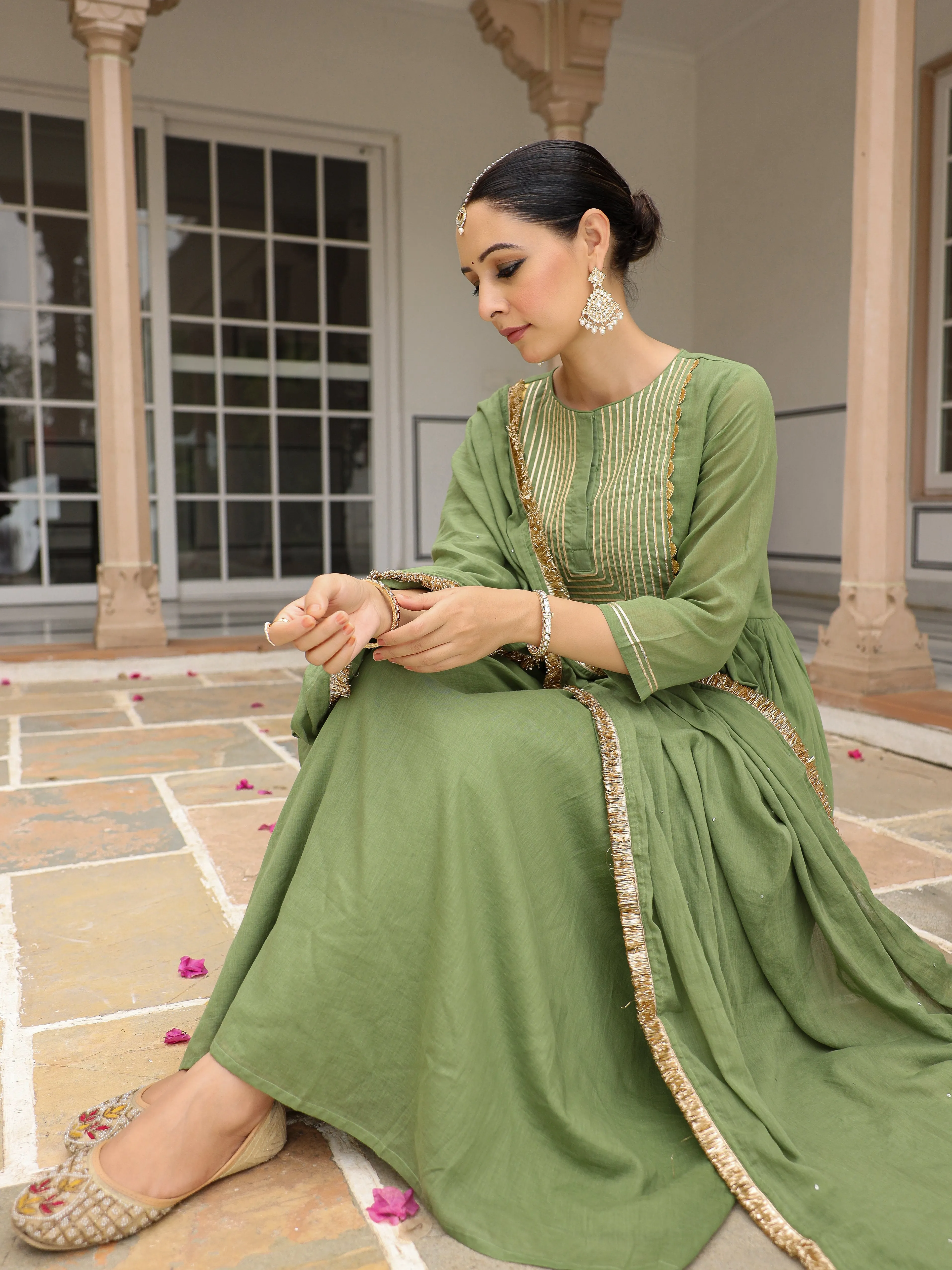 Light green mulmul cotton anarkali kurta set with trousers and dupatta